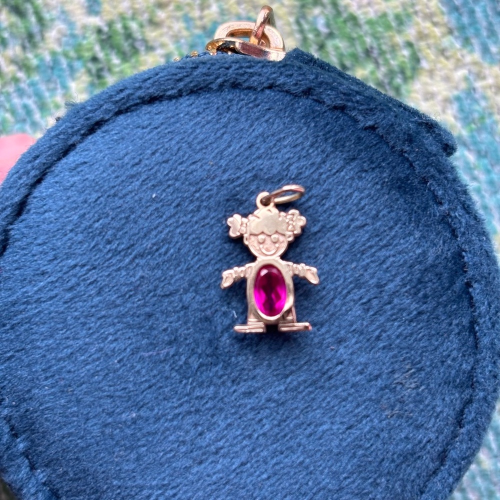 14k gold girl with ruby charm